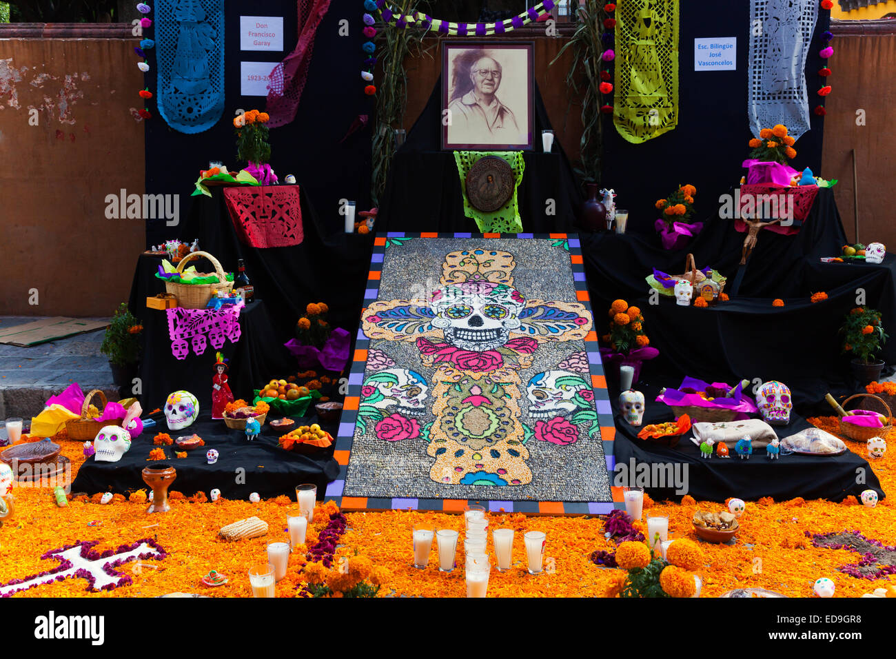 An ALTAR set up in the JARDIN to honor loved ones who have died during DAY OF THE DEAD -  SAN MIGUEL DE ALLENDE, MEXICO Stock Photo