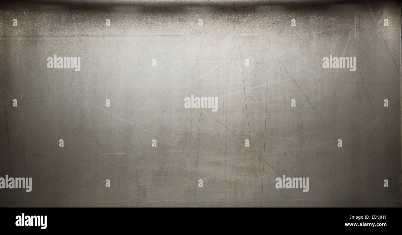 Scratched grey metal as background in closeup Stock Photo - Alamy