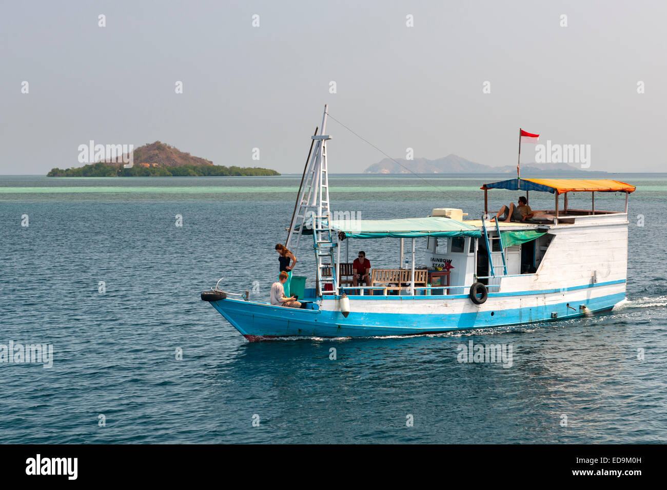 Tourist boat off the coast of Flores island, Indonesia. Stock Photo