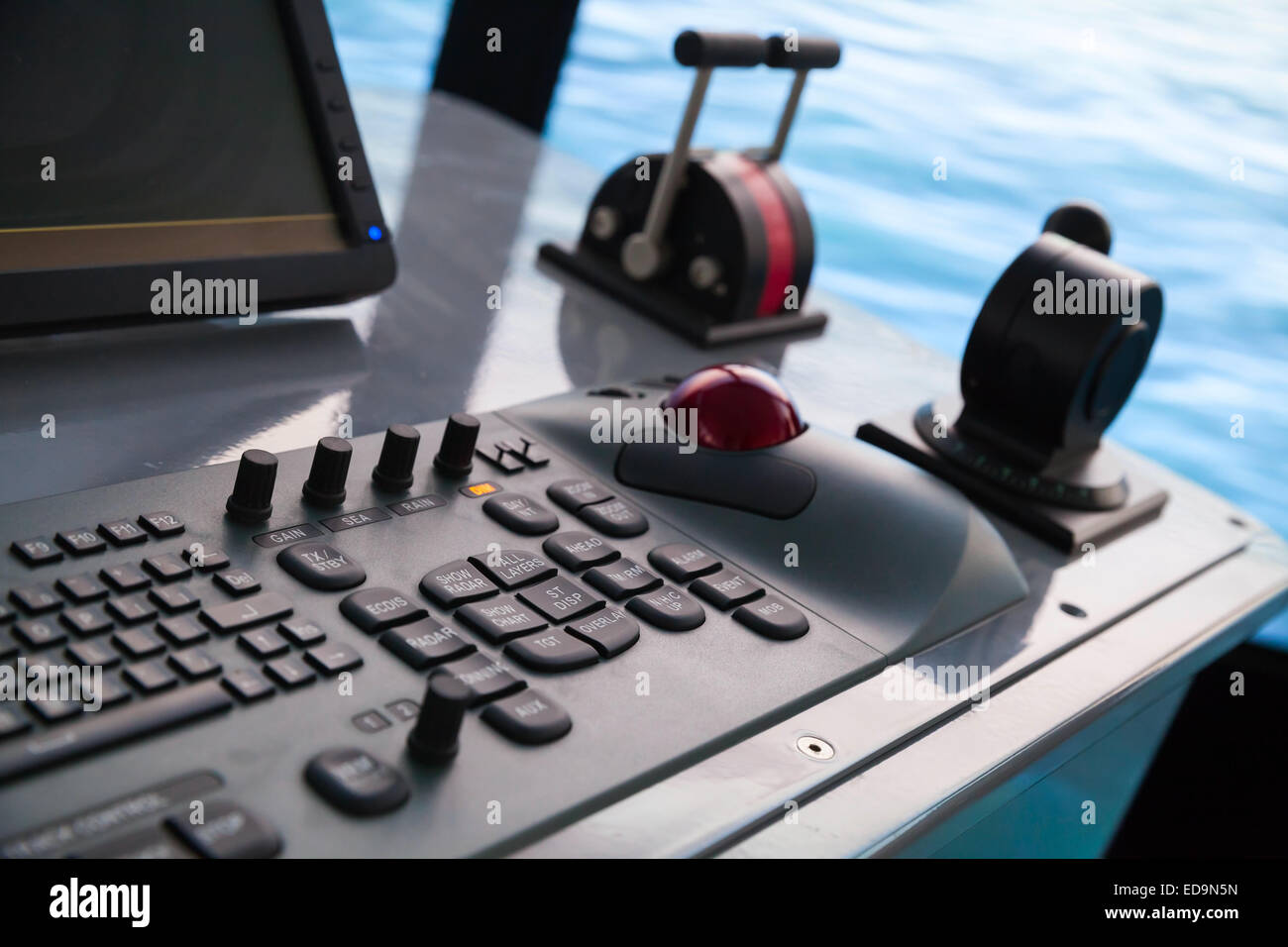 Modern ship control panel with keyboard and accelerator on the captains bridge Stock Photo