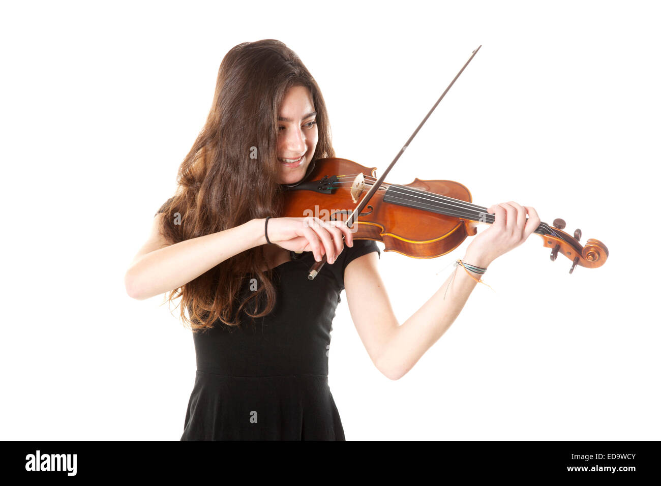 teenage girl plays violin in studio with white background Stock Photo ...
