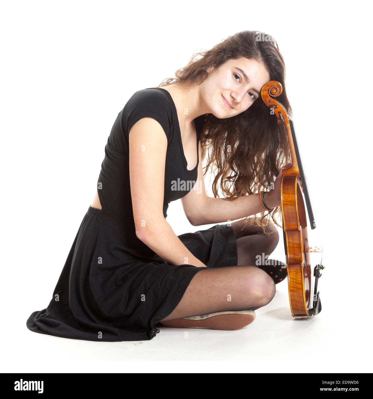 teenage girl and violin in studio with white background Stock Photo - Alamy