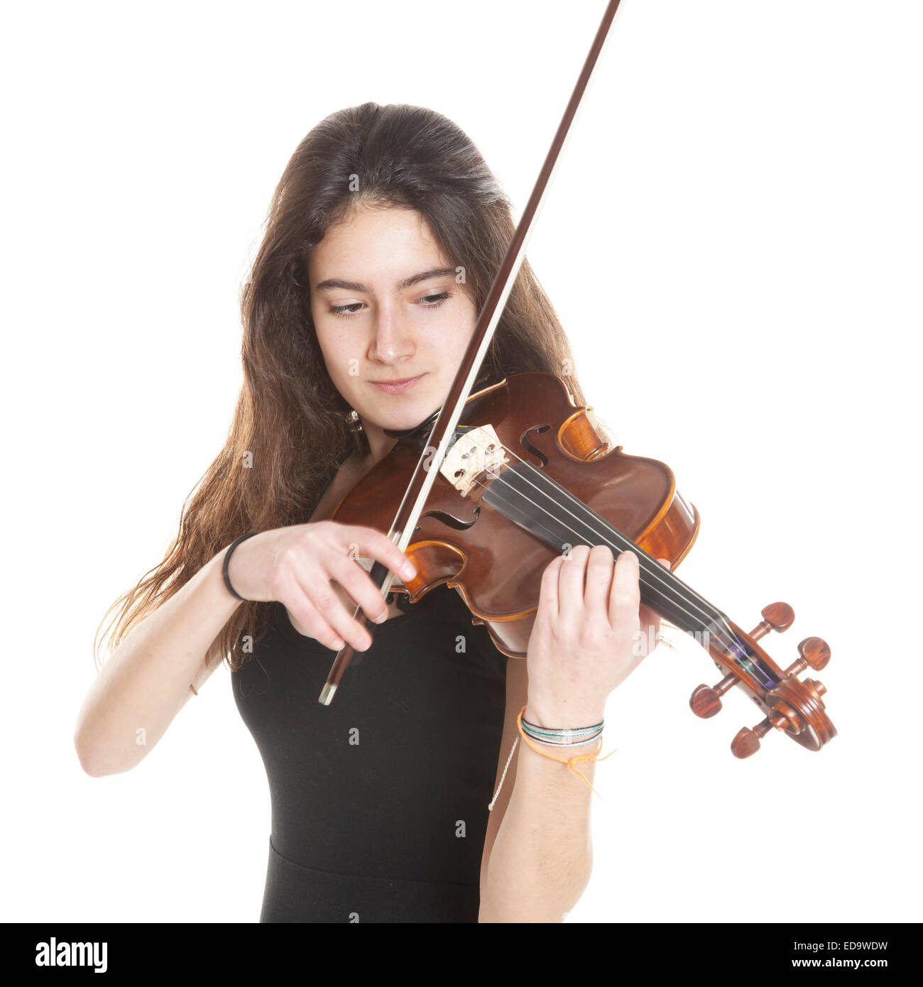 teenage girl plays violin in studio with white background Stock Photo ...