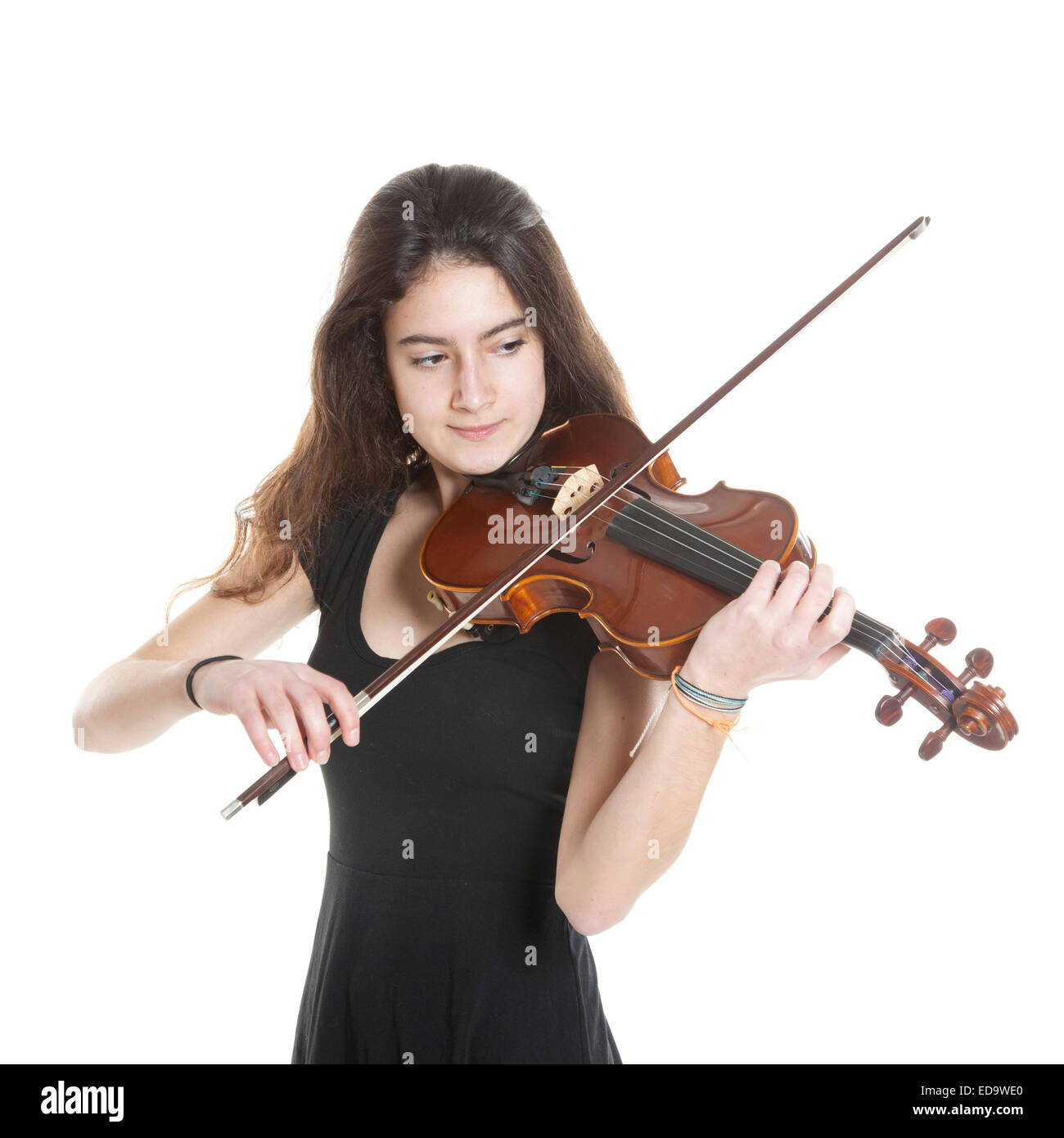 teenage girl plays violin in studio with white background Stock Photo ...