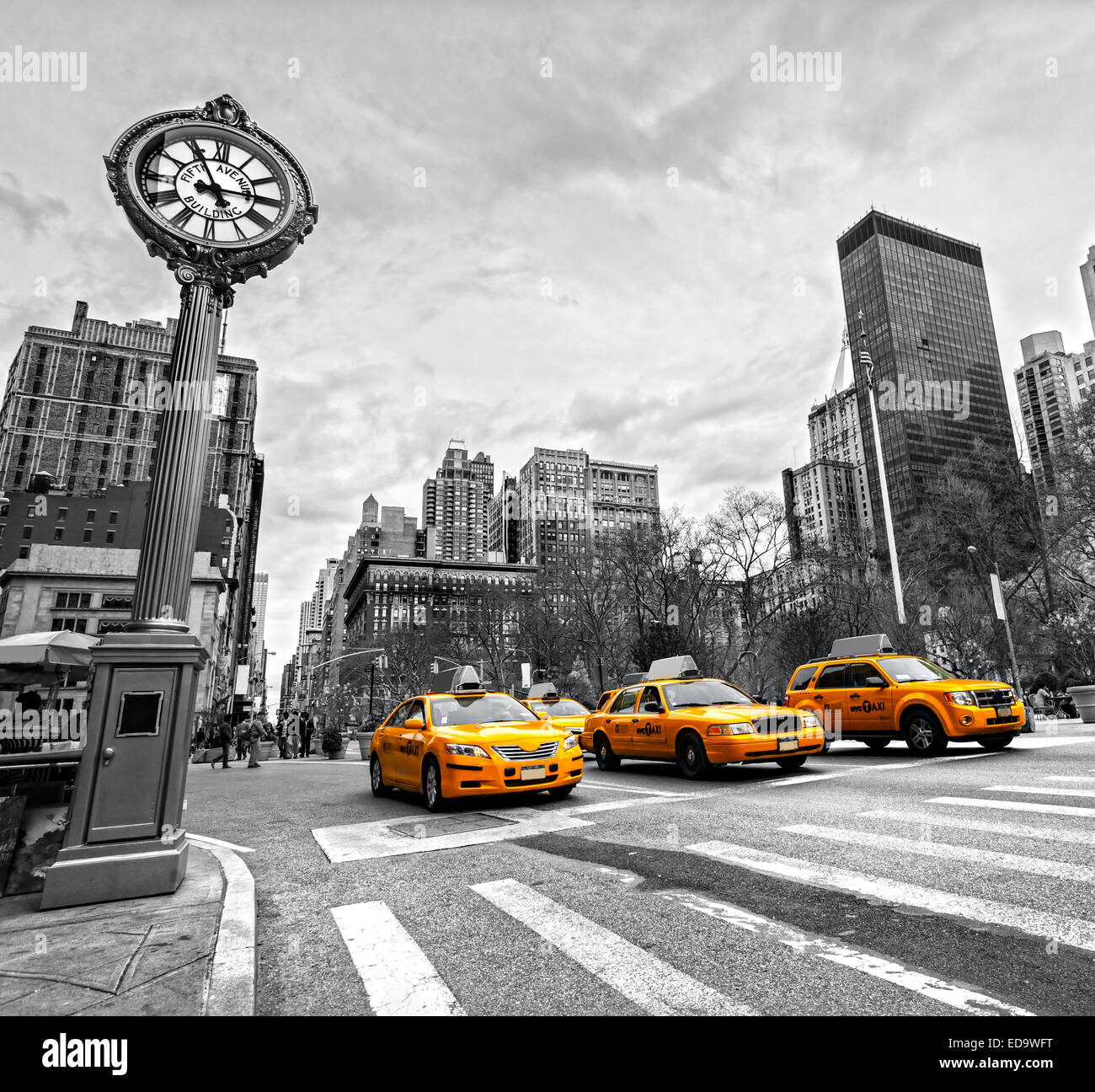 NEW YORK - JULY 21: Yellow taxis on 5th Avenue on July 21 2012 in New York, USA. 5th Avenue is a central road of Manhattan, the Stock Photo