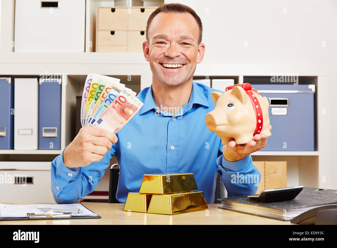 Happy business man with Euro money and gold bars and piggy bank Stock ...