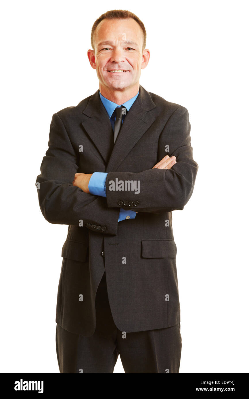 Smiling happy business man with his arms crossed Stock Photo - Alamy