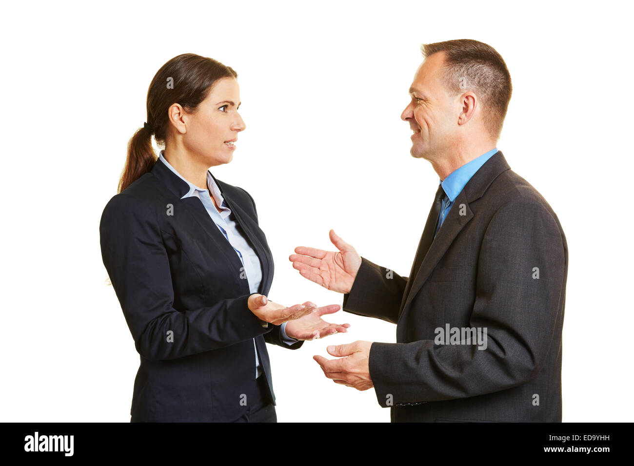 Communication with two talking business people with mimic and gestures Stock Photo