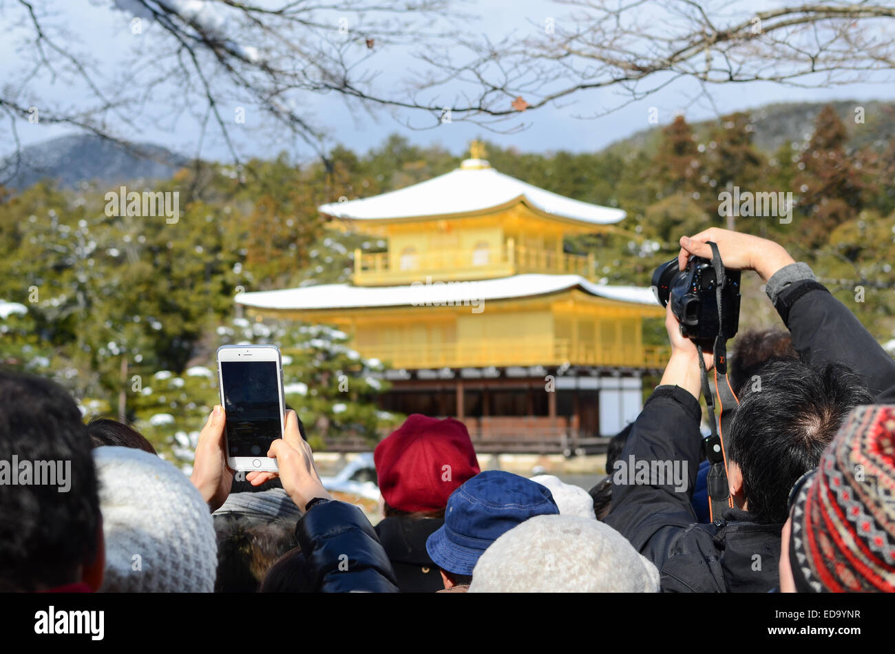 Tourists at Kinkakuji (Golden Temple / Golden Pavilion) in Kyoto, Japan. Stock Photo