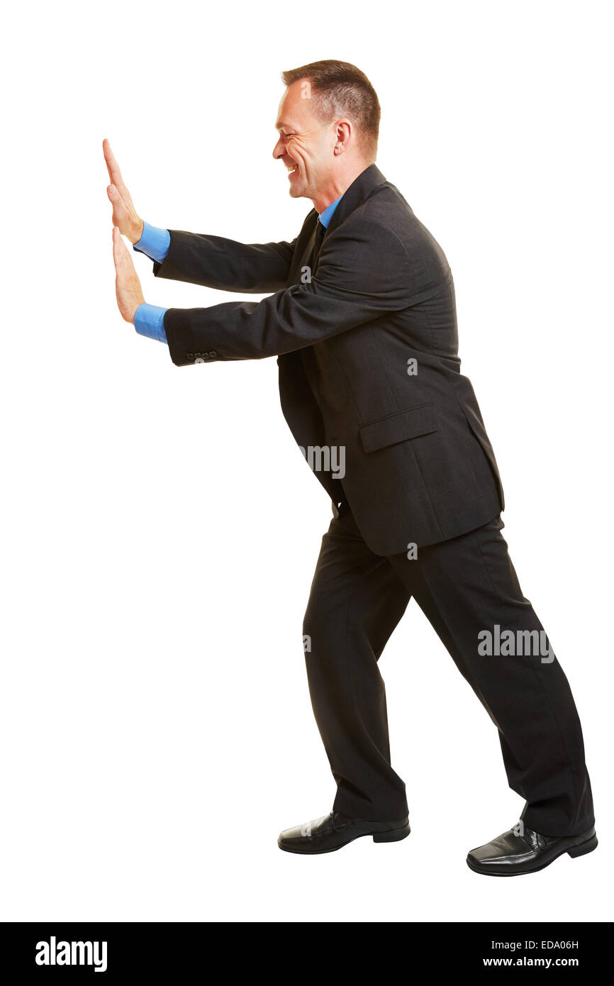 Isolated full body manager pushing imaginary wall to the side Stock Photo