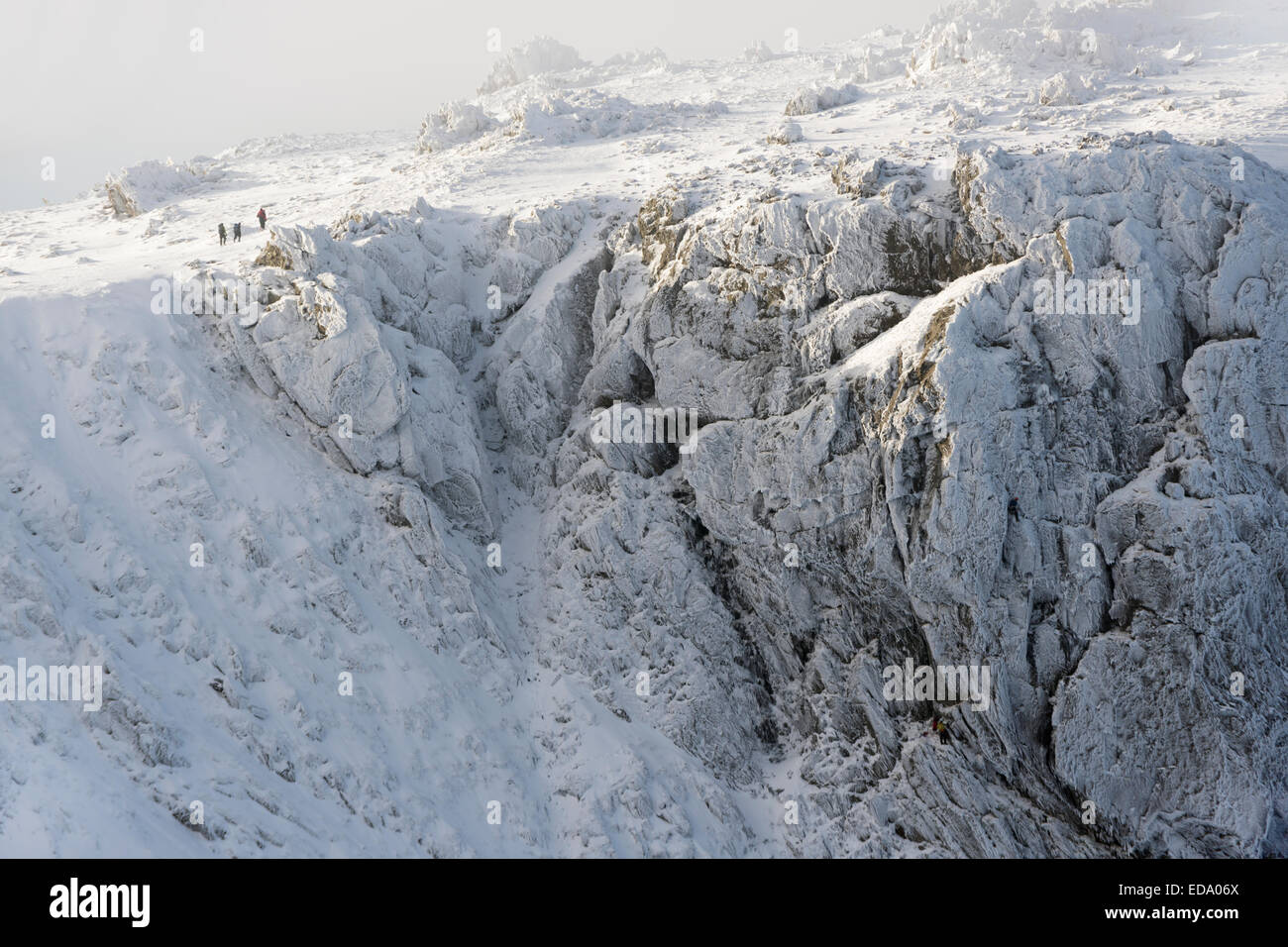 Hillwalkers approaching the top of Glyder Fawr, Snowdonia National Park, Wales, UK Stock Photo