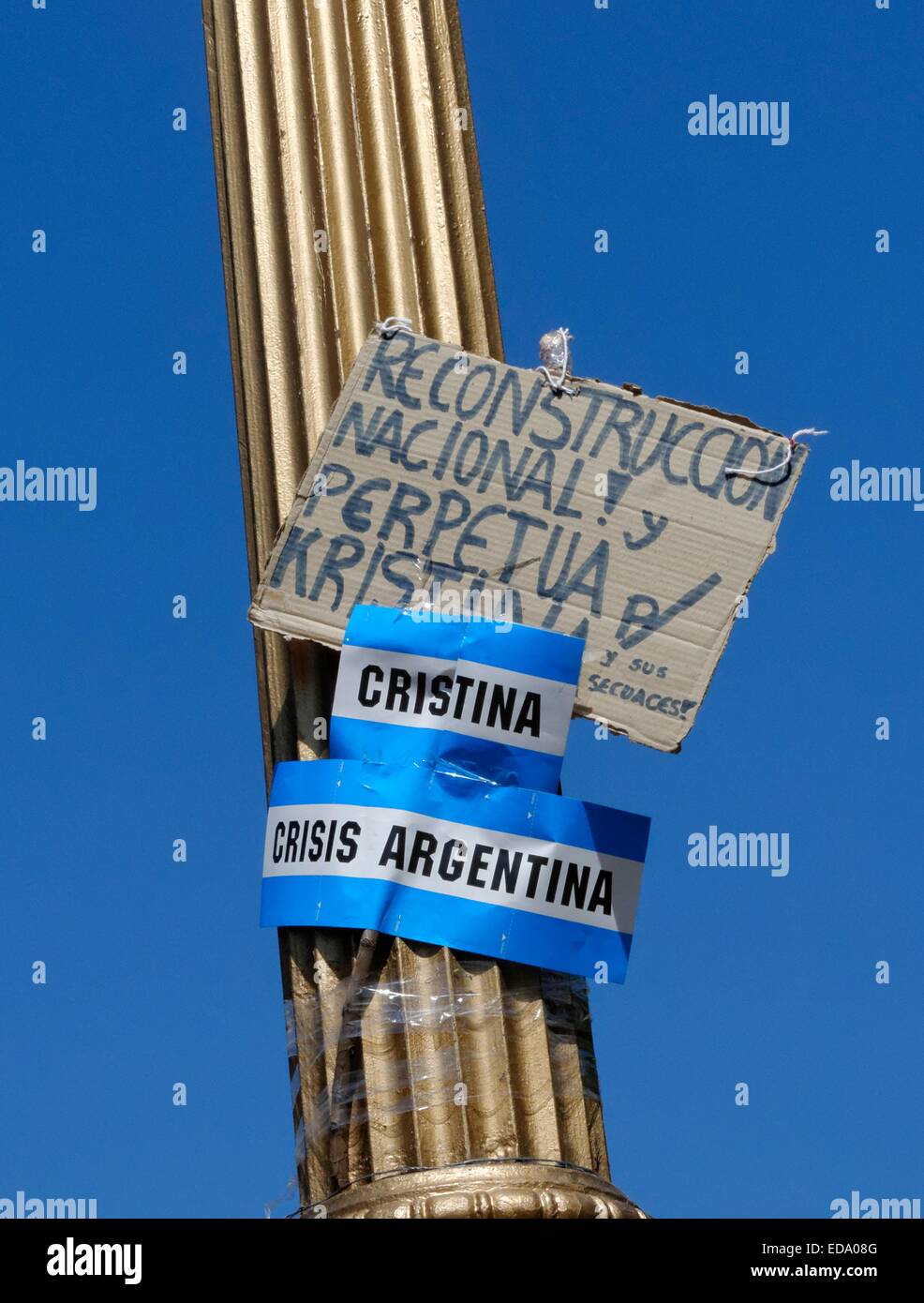 Protest banner and sign on a lamp post in Buenos Aries for 'Crisis in Argentine' joined as Christina Stock Photo