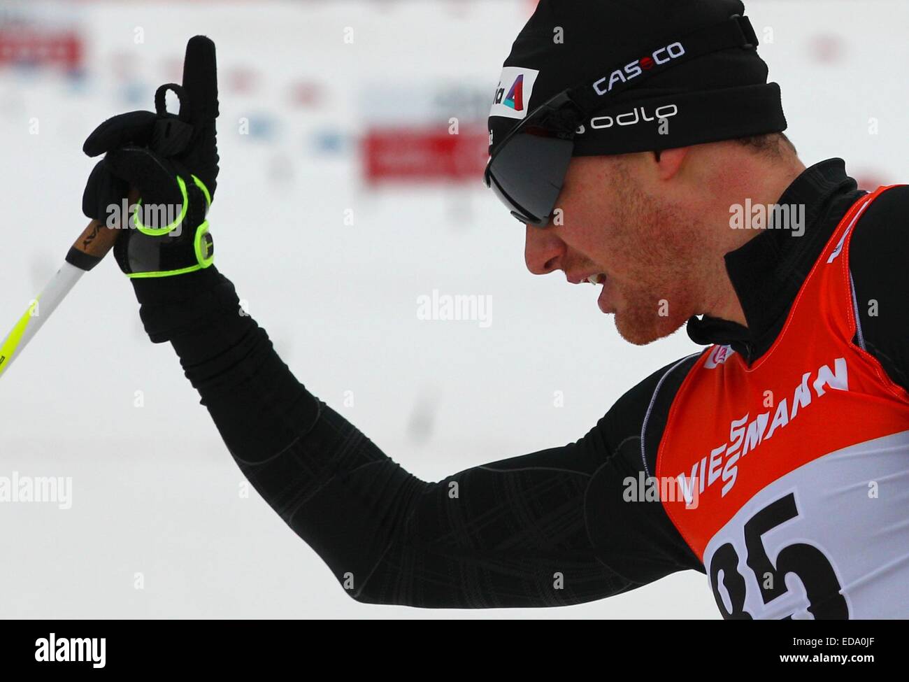 Dario Cologna of Switzerland celebrates after winning the men's opening prologue in cross-country skiing's Tour de Ski Saturday in Oberstdorf, Germany. Photo: Karl-Josef Hildenbrand /dpa Stock Photo