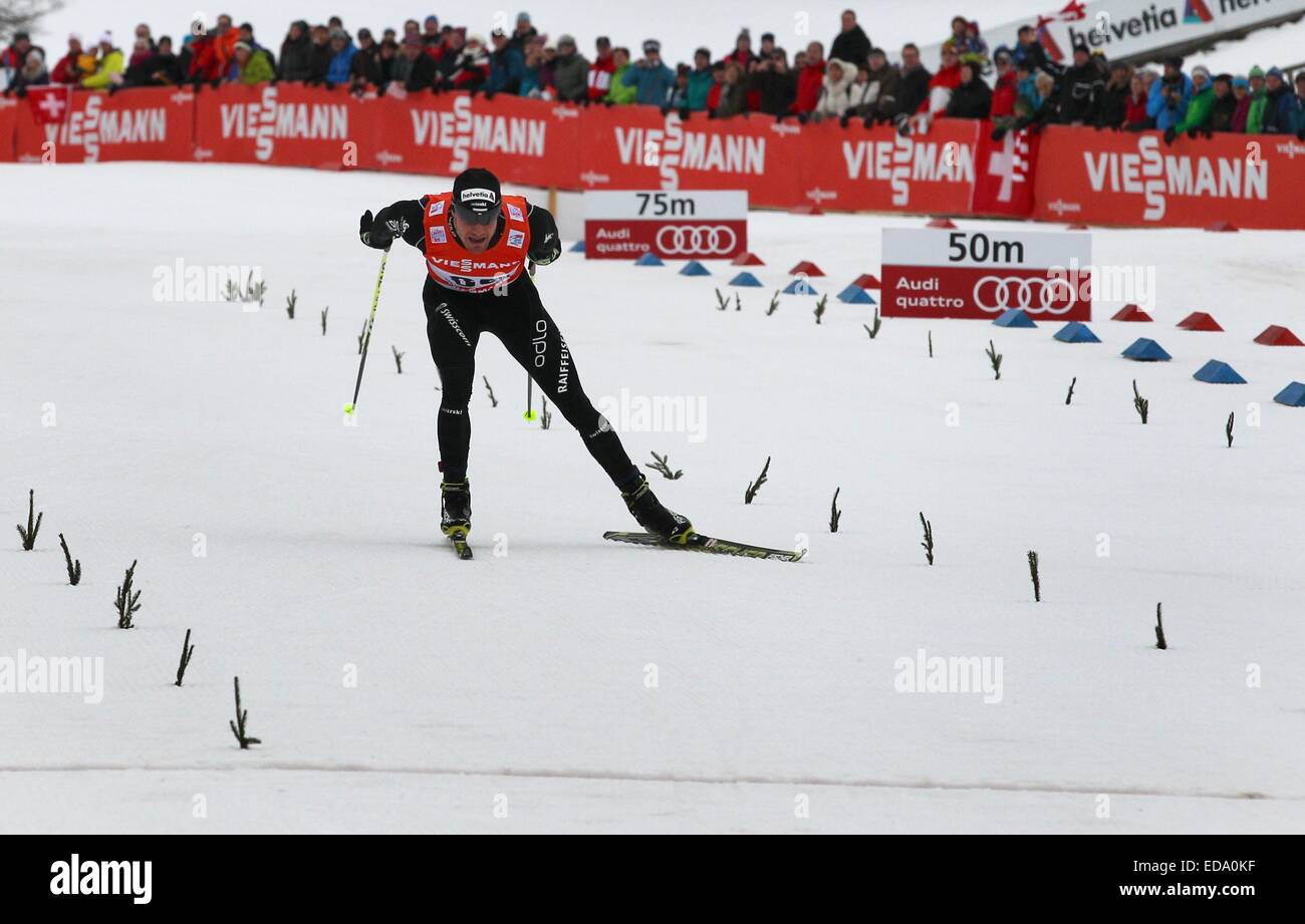 Oberstdorf, Germany. 3rd Jan, 2015. Dario Cologna of Switzerland in action during the men's opening prologue in cross-country skiing's Tour de Ski Saturday in Oberstdorf, Germany, 3 January 2015. PHOTO: KARL-JOSEF HILDENBRAND /DPA/Alamy Live News Stock Photo