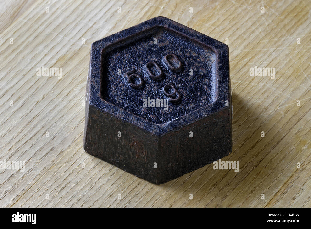 Close up of an antique 500 gram weight. Measurement concept. Stock Photo