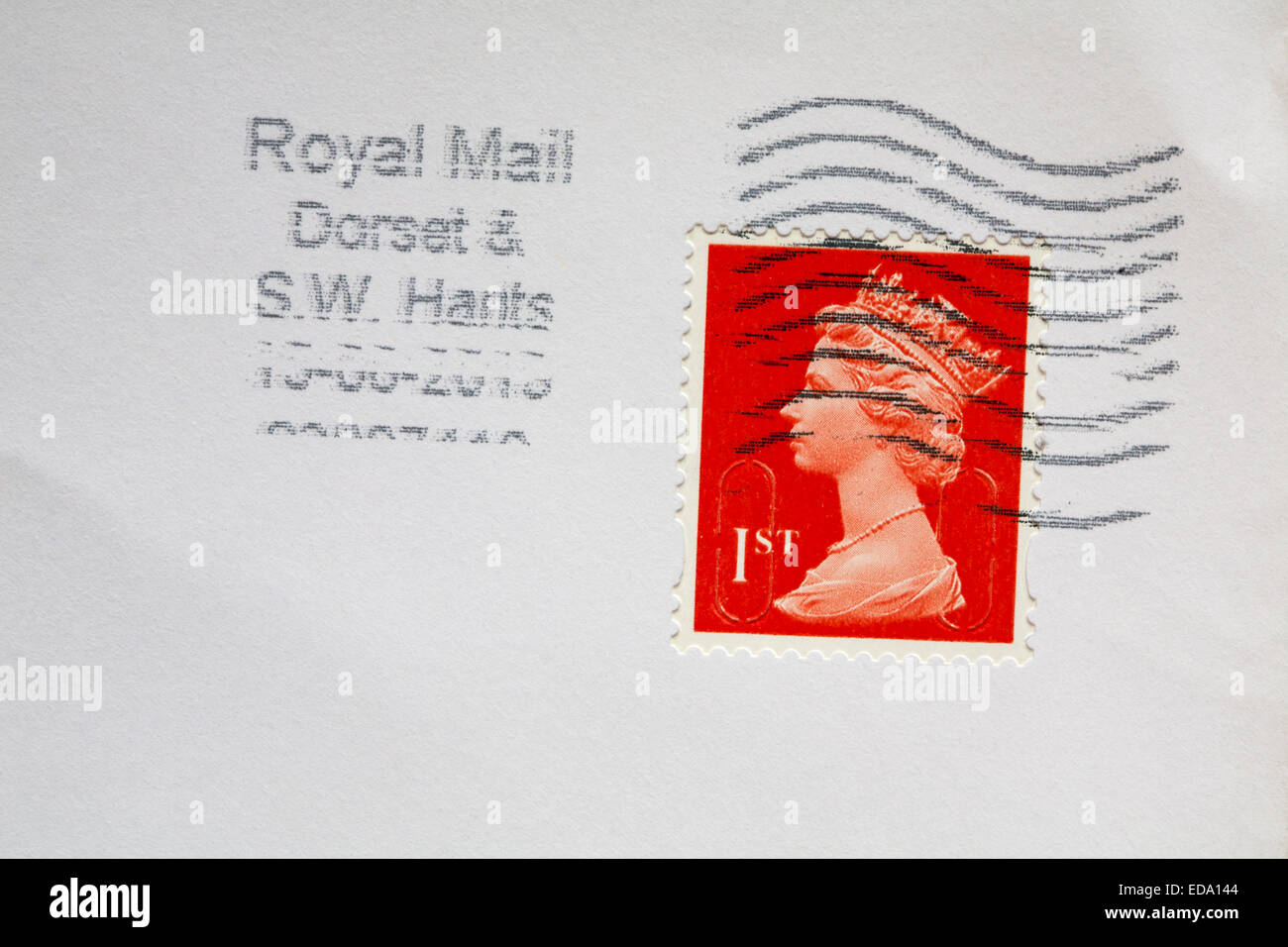 1st class stamp with Queens head on envelope Stock Photo Alamy