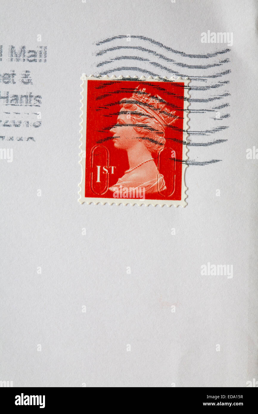 1st class stamp on envelope Stock Photo Alamy