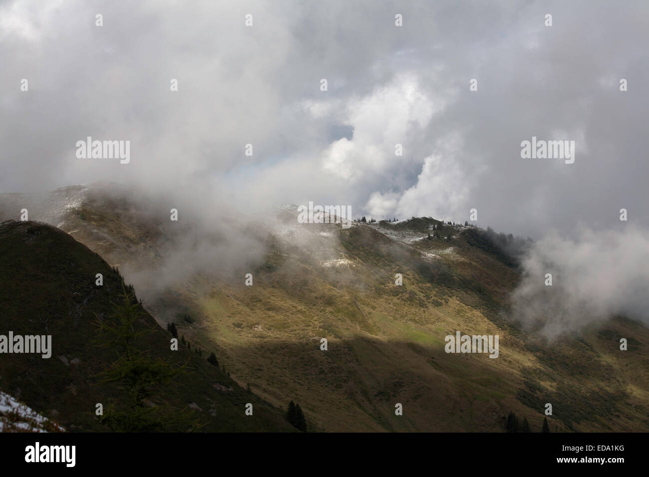 Cloud and snow The Maurerkogel from The Schmittenhohe above Zell am See Pinzgau Salzbergerland Austria Stock Photo