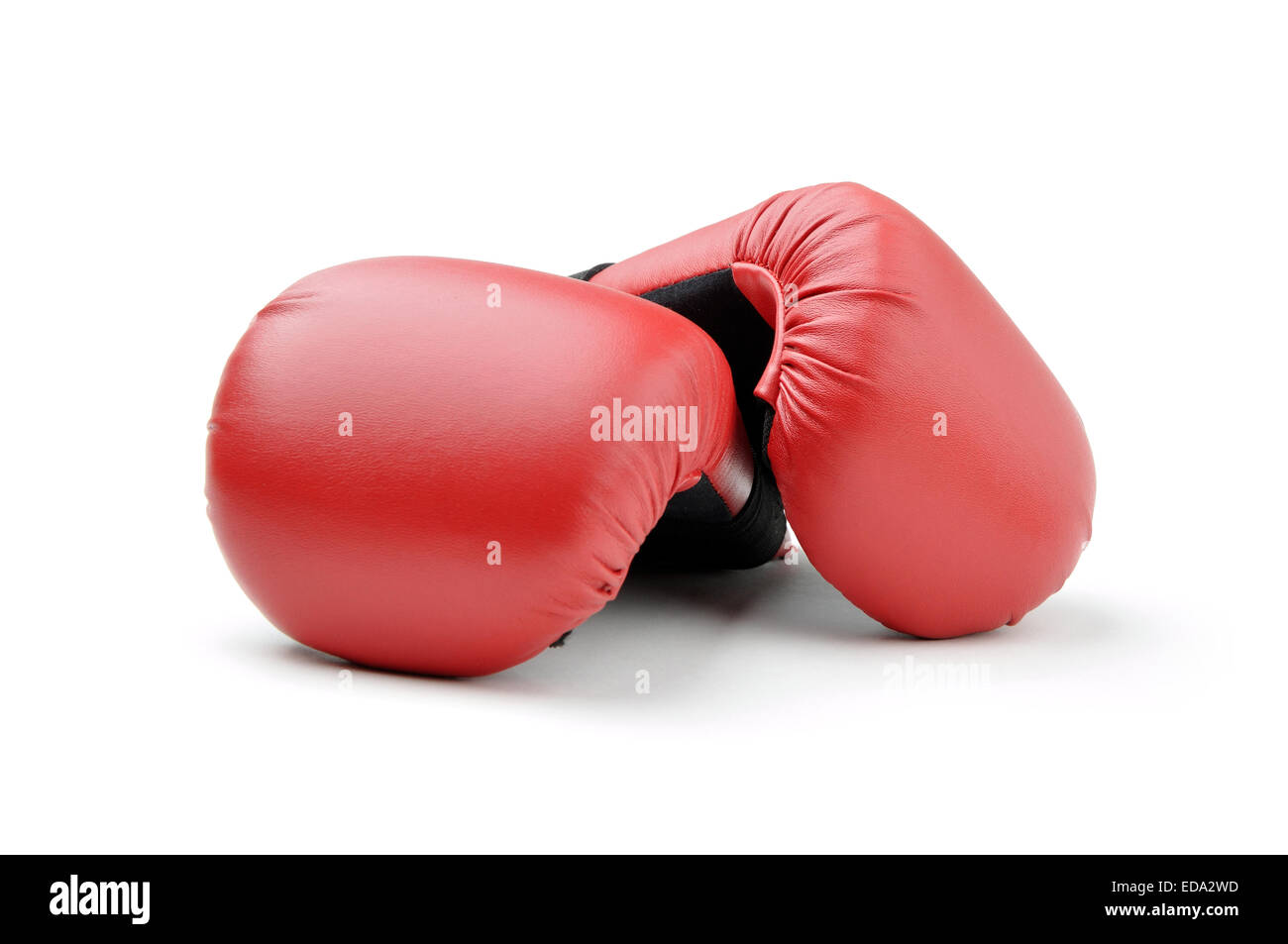 red leather boxing gloves for punching bag or for karate on white background Stock Photo