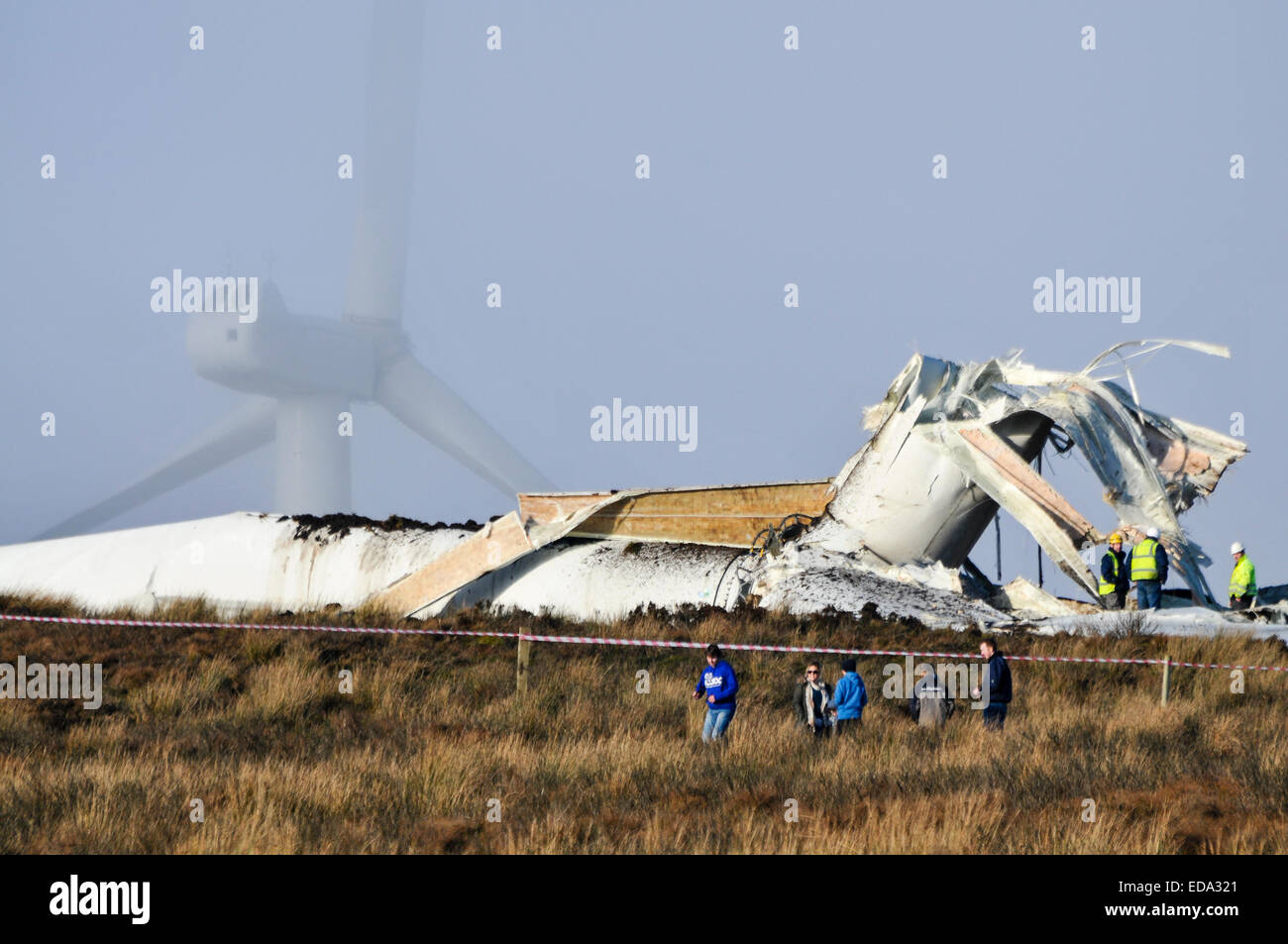 Fintona, Northern Ireland.  3 Jan 2015 - An 80m wind turbine disintegrated and collapsed after developing a fault.  Local residents say the Screggagh wind farm on Murley mountain developed a noise which could be heard 10 miles away, before speeding up and finally disintegrating.  Debris, some the size of cars was flung over 1/2 a mile away.  Nobody was injured. Credit:  Stephen Barnes/Alamy Live News Stock Photo