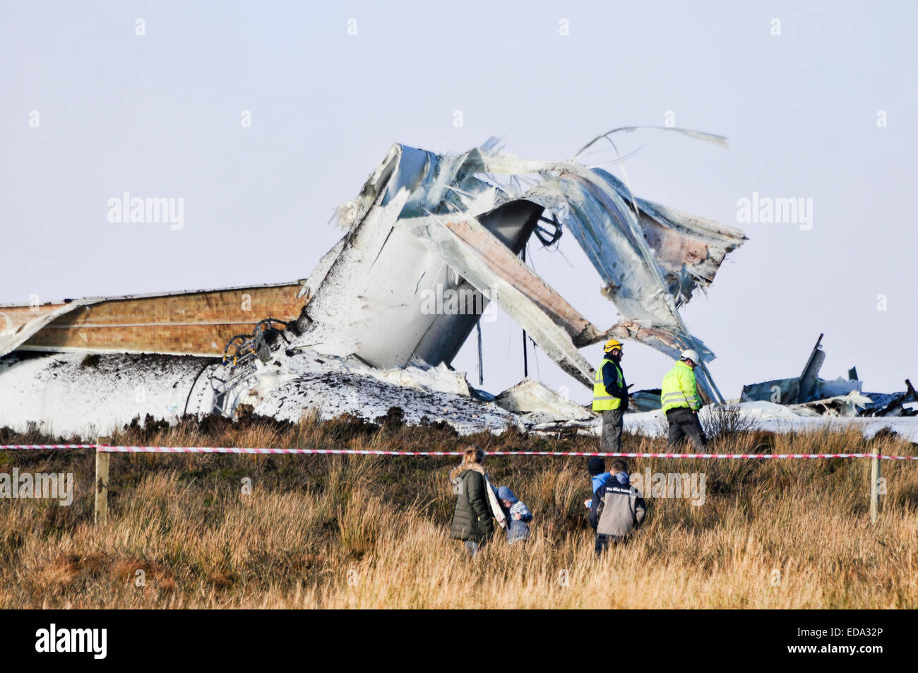 Fintona, Northern Ireland.  3 Jan 2015 - An 80m wind turbine disintegrated and collapsed after developing a fault.  Local residents say the Screggagh wind farm on Murley mountain developed a noise which could be heard 10 miles away, before speeding up and finally disintegrating.  Debris, some the size of cars was flung over 1/2 a mile away.  Nobody was injured. Credit:  Stephen Barnes/Alamy Live News Stock Photo