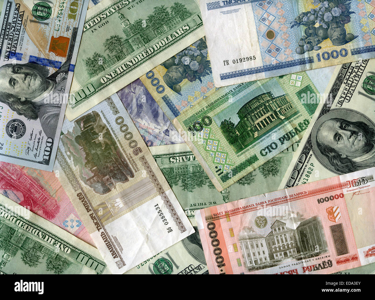US dollars and Belarus banknotes (rubles) background Stock Photo
