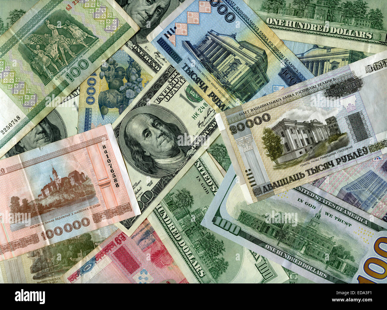 US dollars and Belarus banknotes (rubles) background Stock Photo