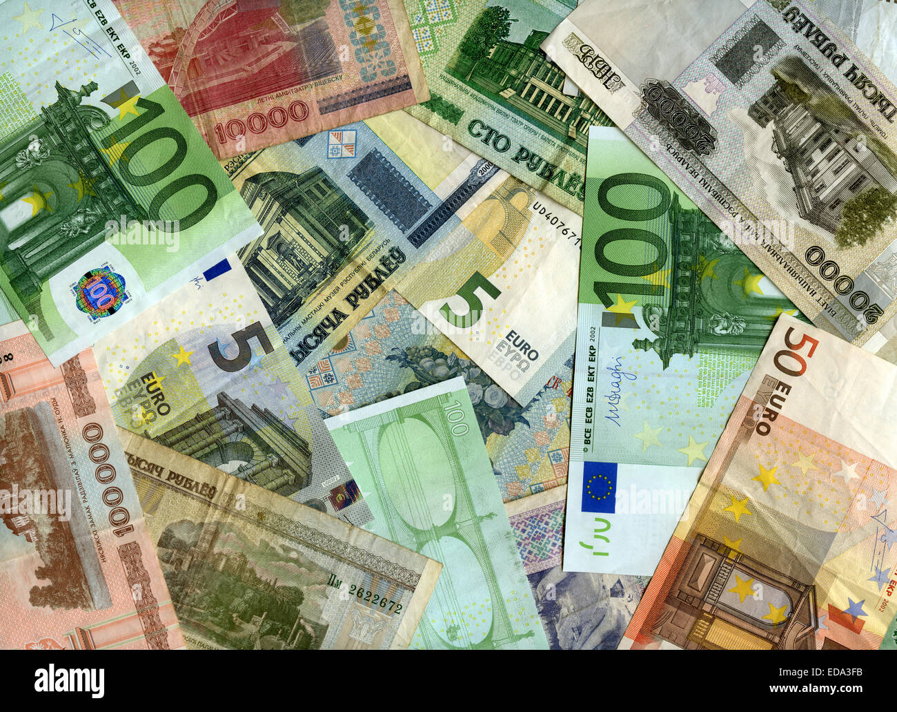 European currency (Euro) and Belarusian banknotes (Rubles) background Stock Photo