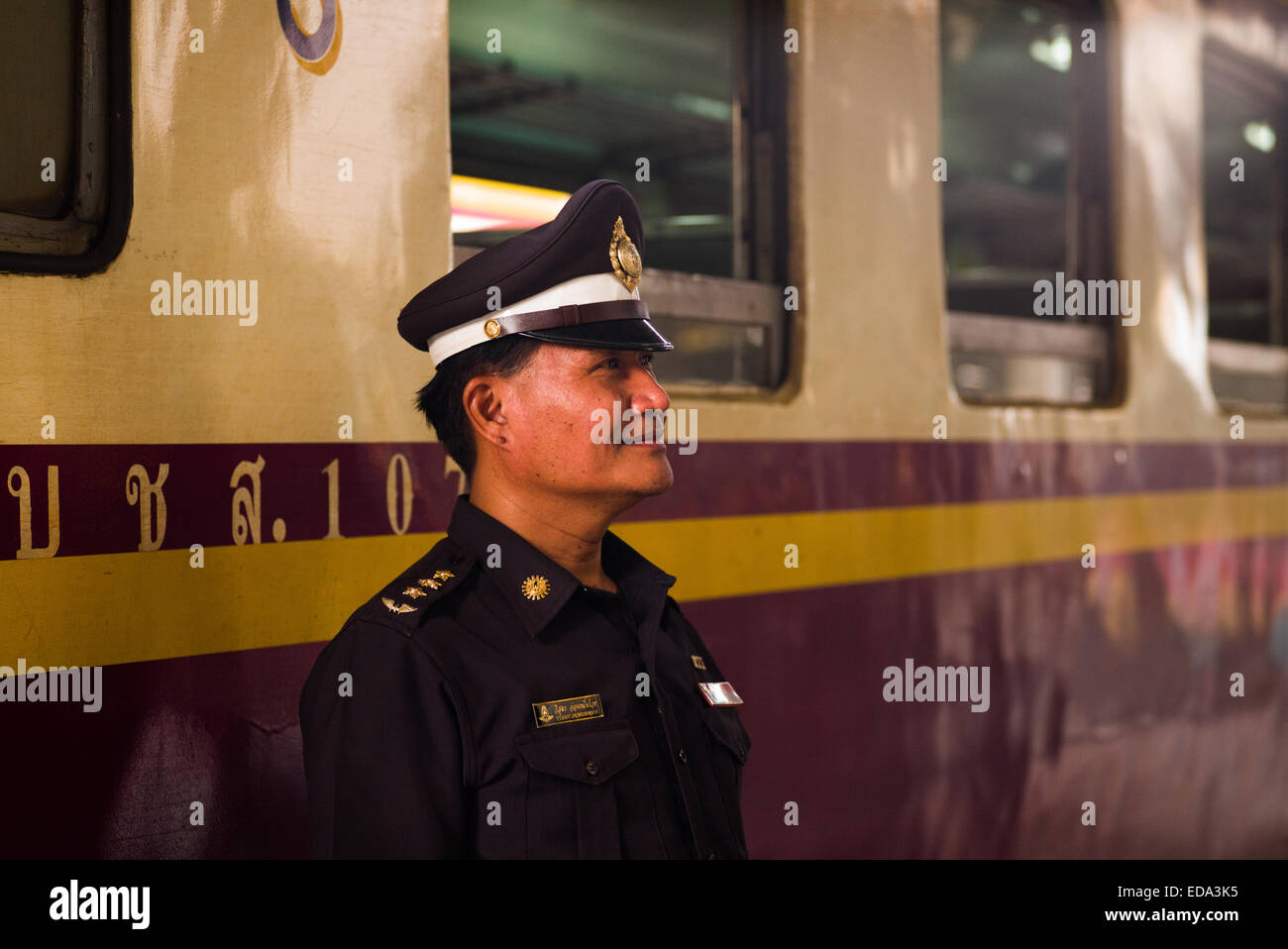 Train conductor, Hualamphong main train station, Bangkok, Thailand. Stock Photo