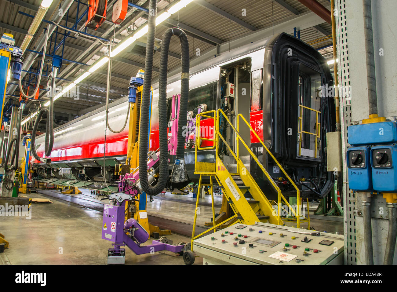 fitting windows on passenger car Stock Photo Alamy