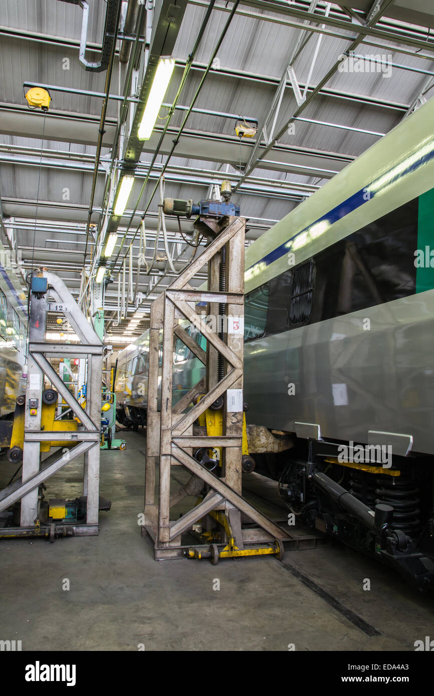 lifting a railway wagon for maintenance in a major repairs Stock Photo Alamy