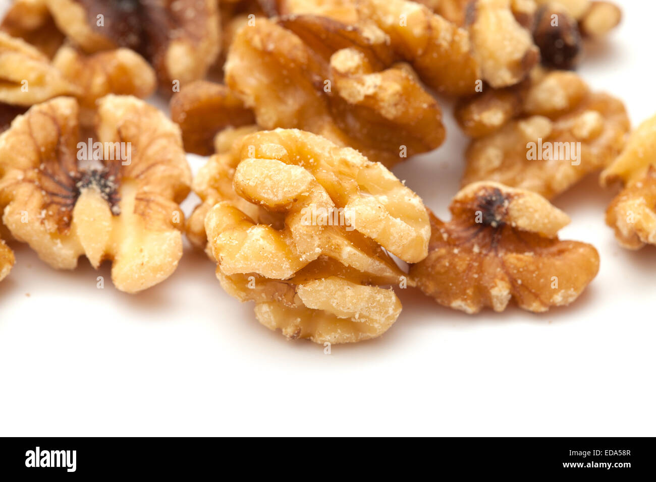 shelled walnuts isolated on white background Stock Photo