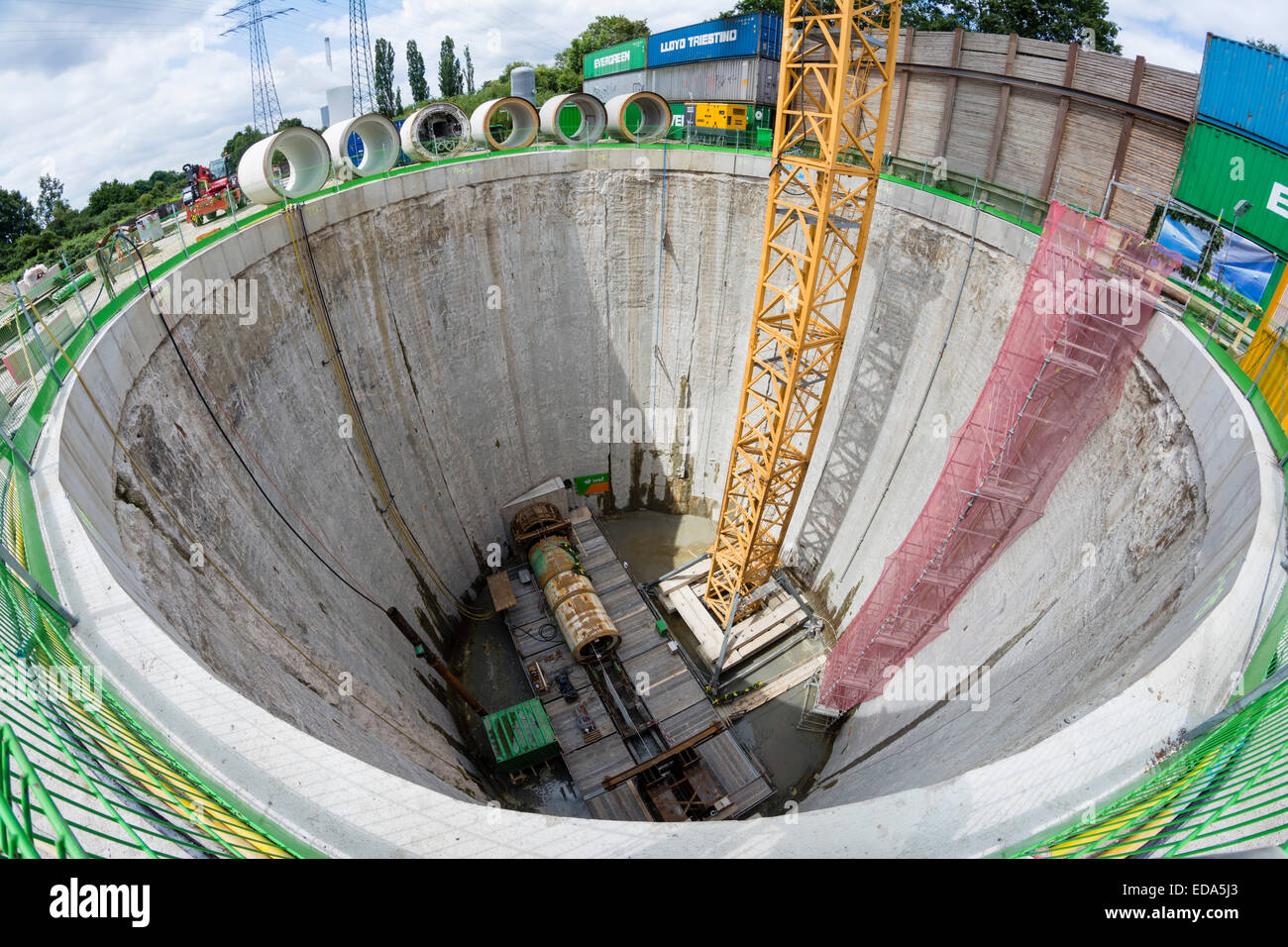A 22 meter deep well is part of a construction site of the river Emscher sewer tunnel. Stock Photo