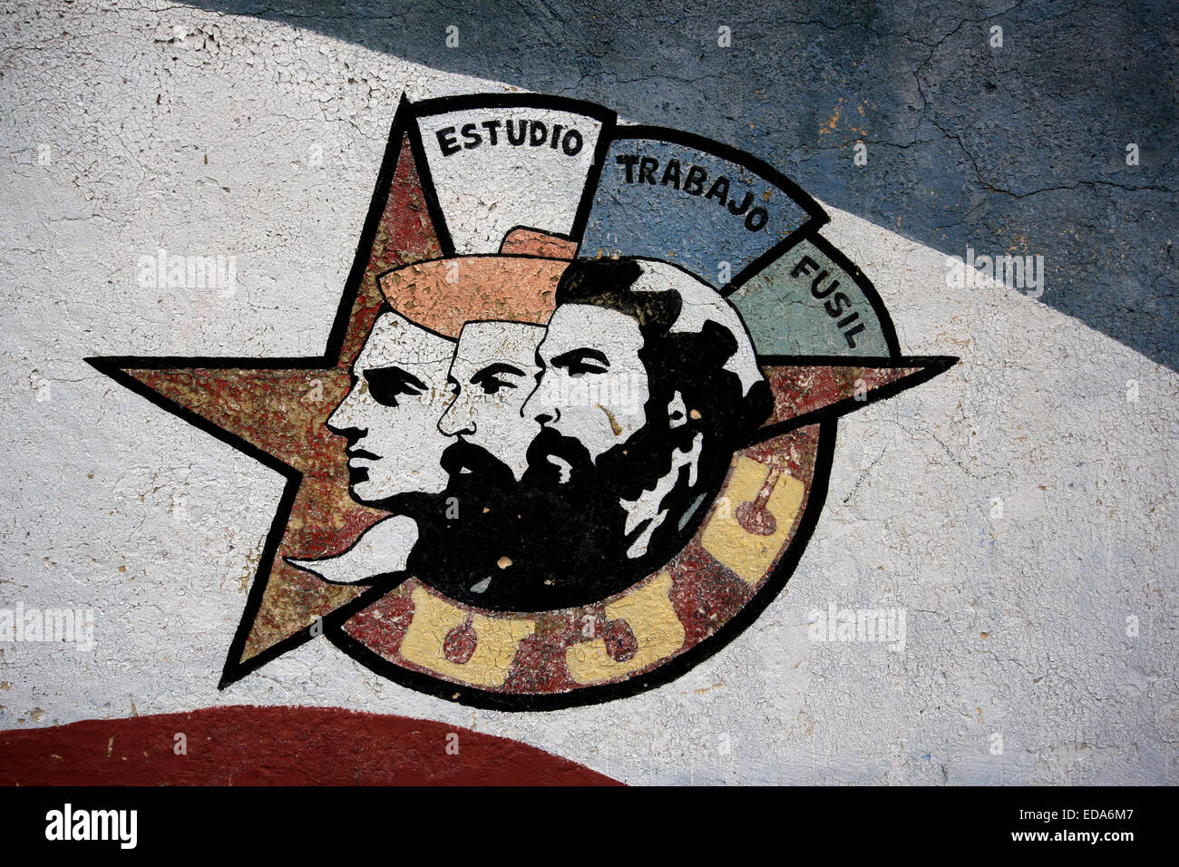 Symbol of The Young Communist League painted on a wall in Havana, Cuba with the motto Estudio Trabajo Fusil: Study, Work, Rifle Stock Photo