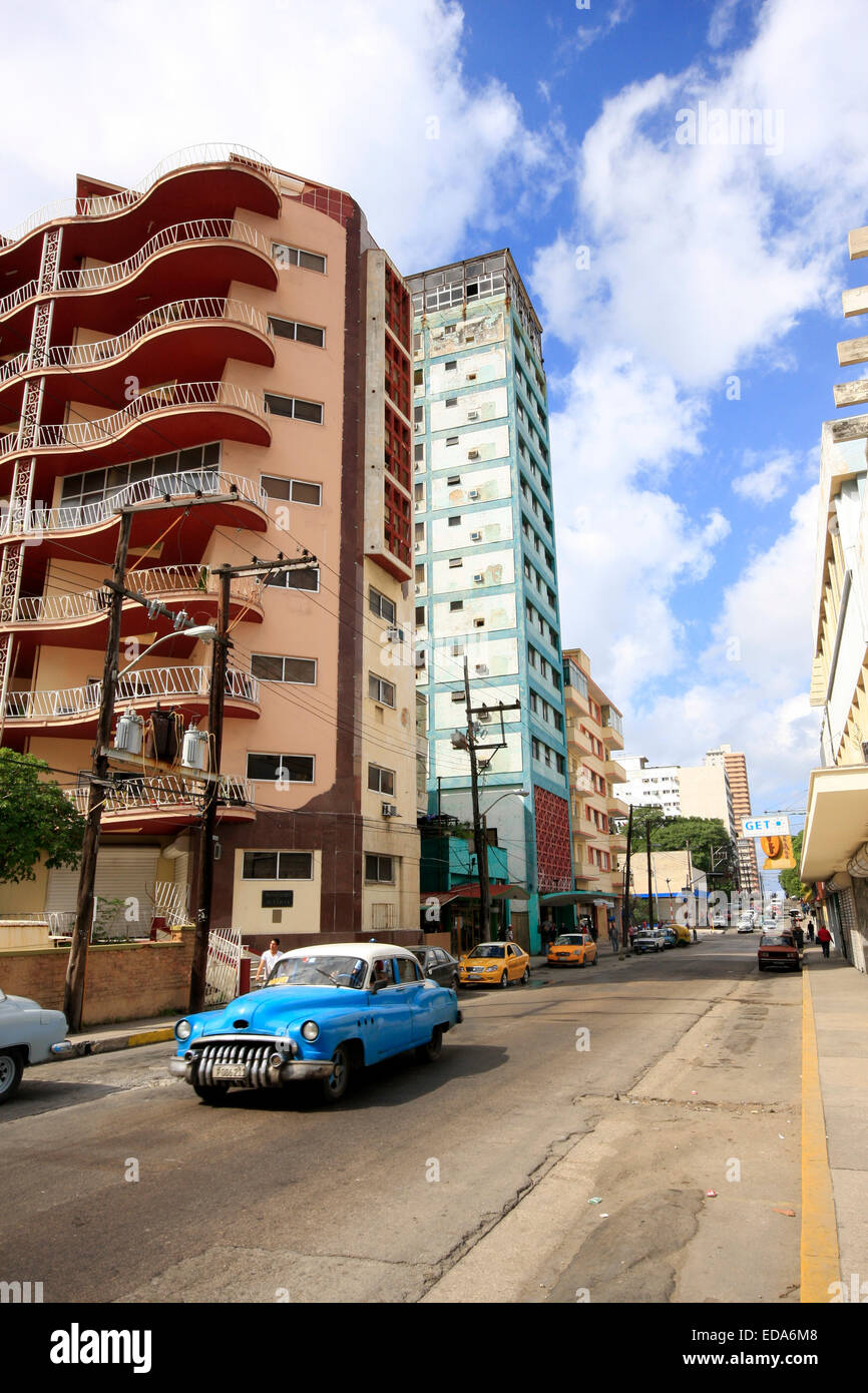 An old American car driving on a road in the city of Havana in Cuba Stock Photo