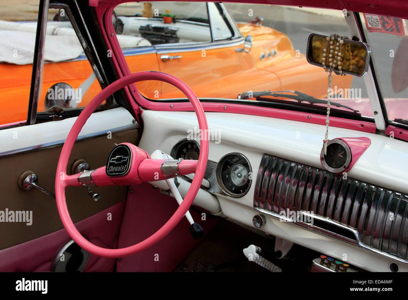 Steering wheel and dashboard of a vintage Chevrolet in Havana, Cuba Stock Photo