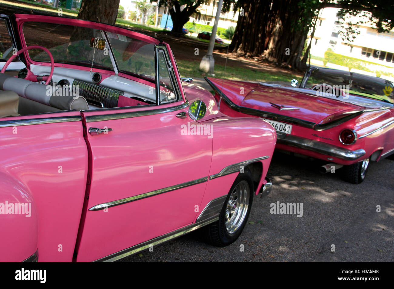 Classic American convertible vintage cars lined parked in a street in Havana, Cuba Stock Photo