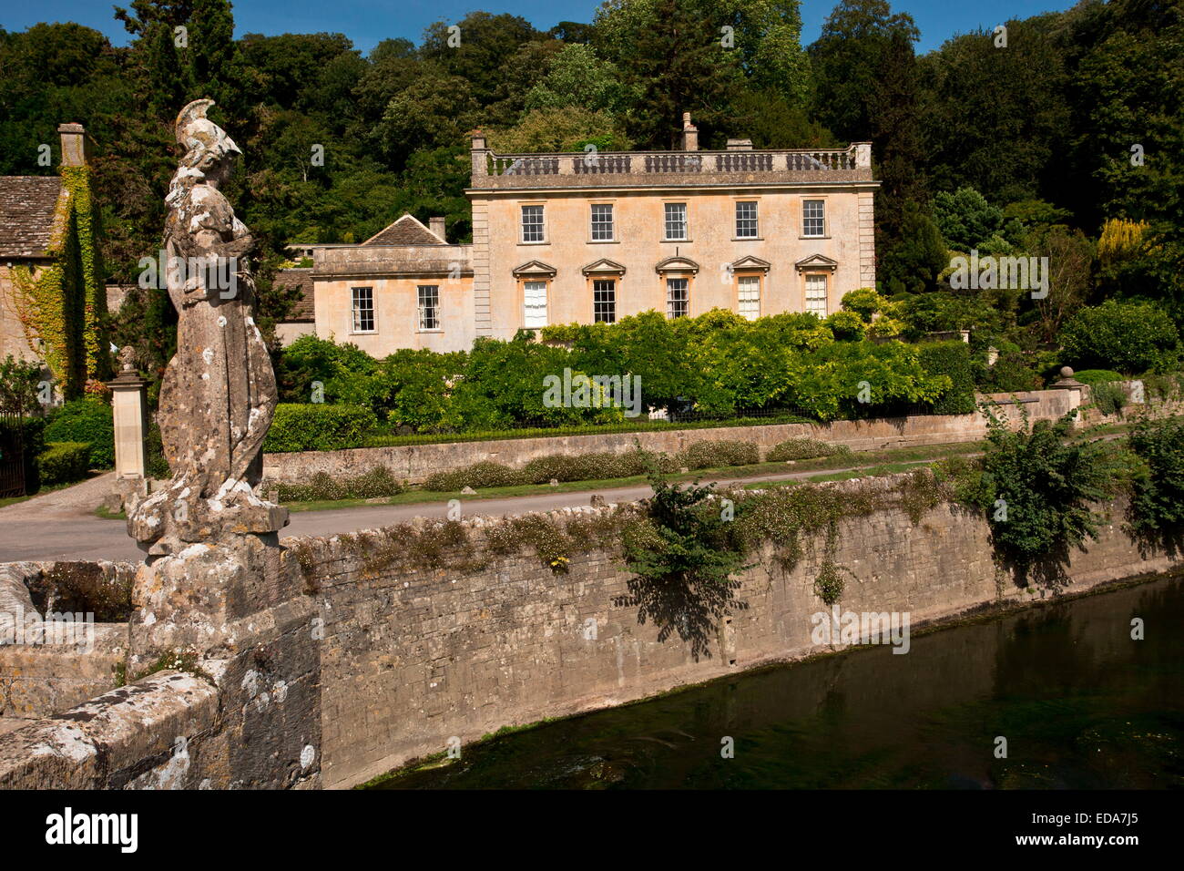 Old bridge at Iford Manor, by the River Frome, in Wiltshire, near Bath. Stock Photo