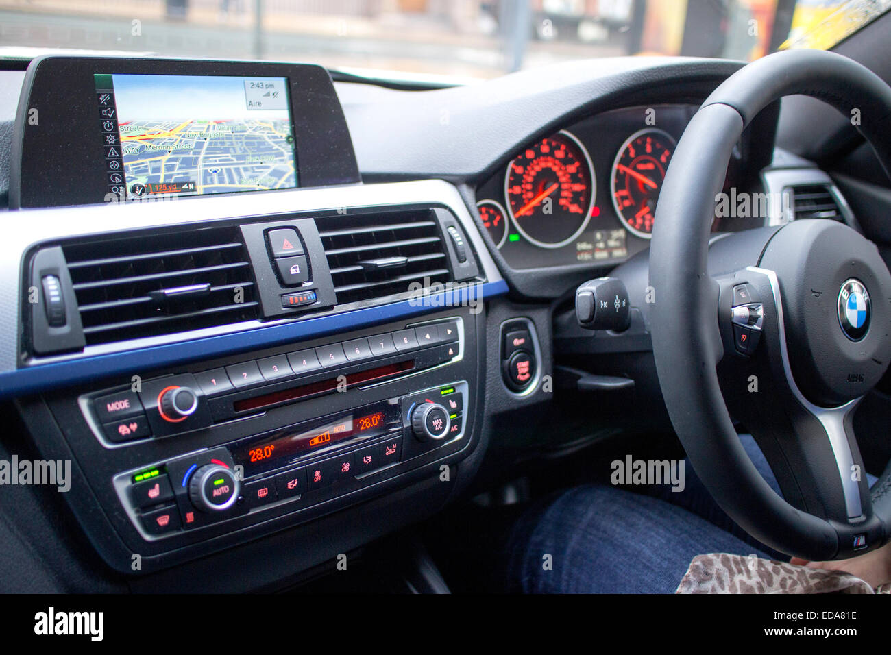 puzzle evaluate to see Interior dash of a BMW 3 Series (F30) Sixth generation Stock Photo - Alamy