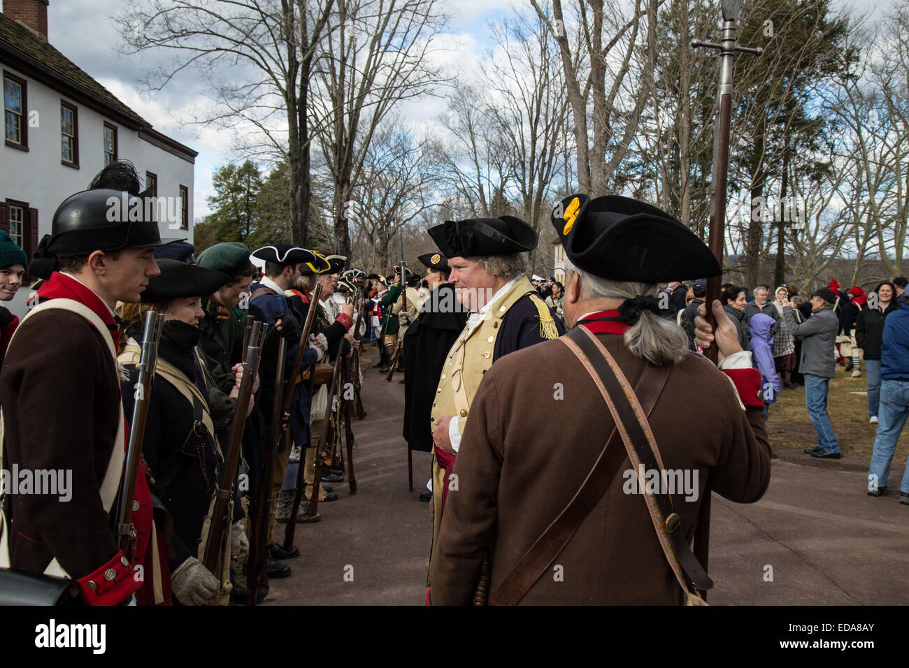 A reenactor portraying General George Washington reviews his troops before crossing the Delaware River on Christmas Day. Stock Photo