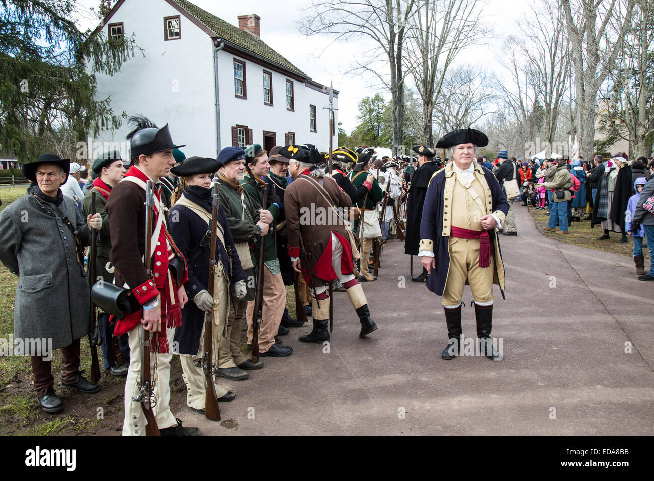 A reenactor portraying General George Washington reviews his troops before crossing the Delaware River on Christmas Day. Stock Photo