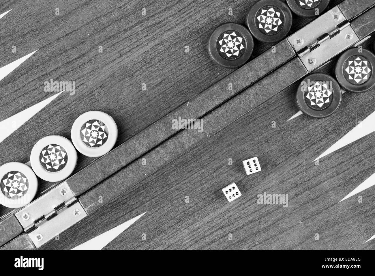 Backgammon table and double six dice closeup black and white Stock Photo