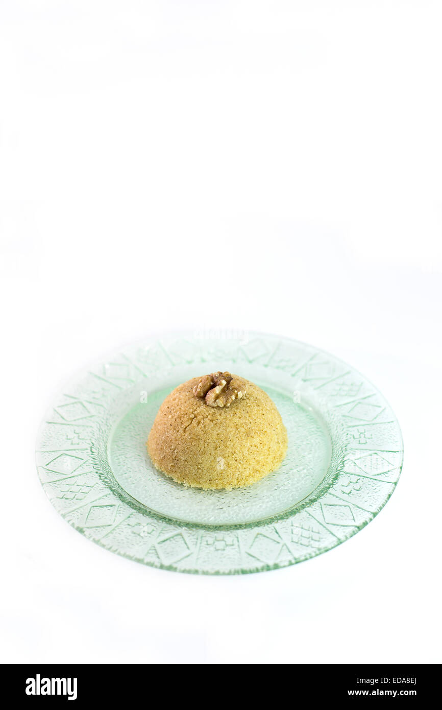 Traditional Turkish semolina sweet desert halva-irmik helvasi with nuts Stock Photo