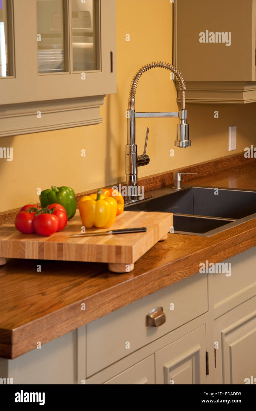 Kitchen counter with vegetables on cutter board Stock Photo Alamy