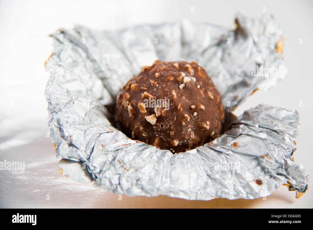 Almond chocolate ball isolated on white background Stock Photo Alamy