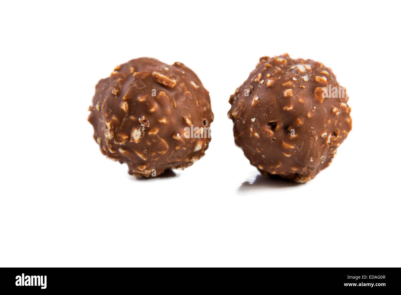 Almond chocolate ball isolated on white background Stock Photo Alamy