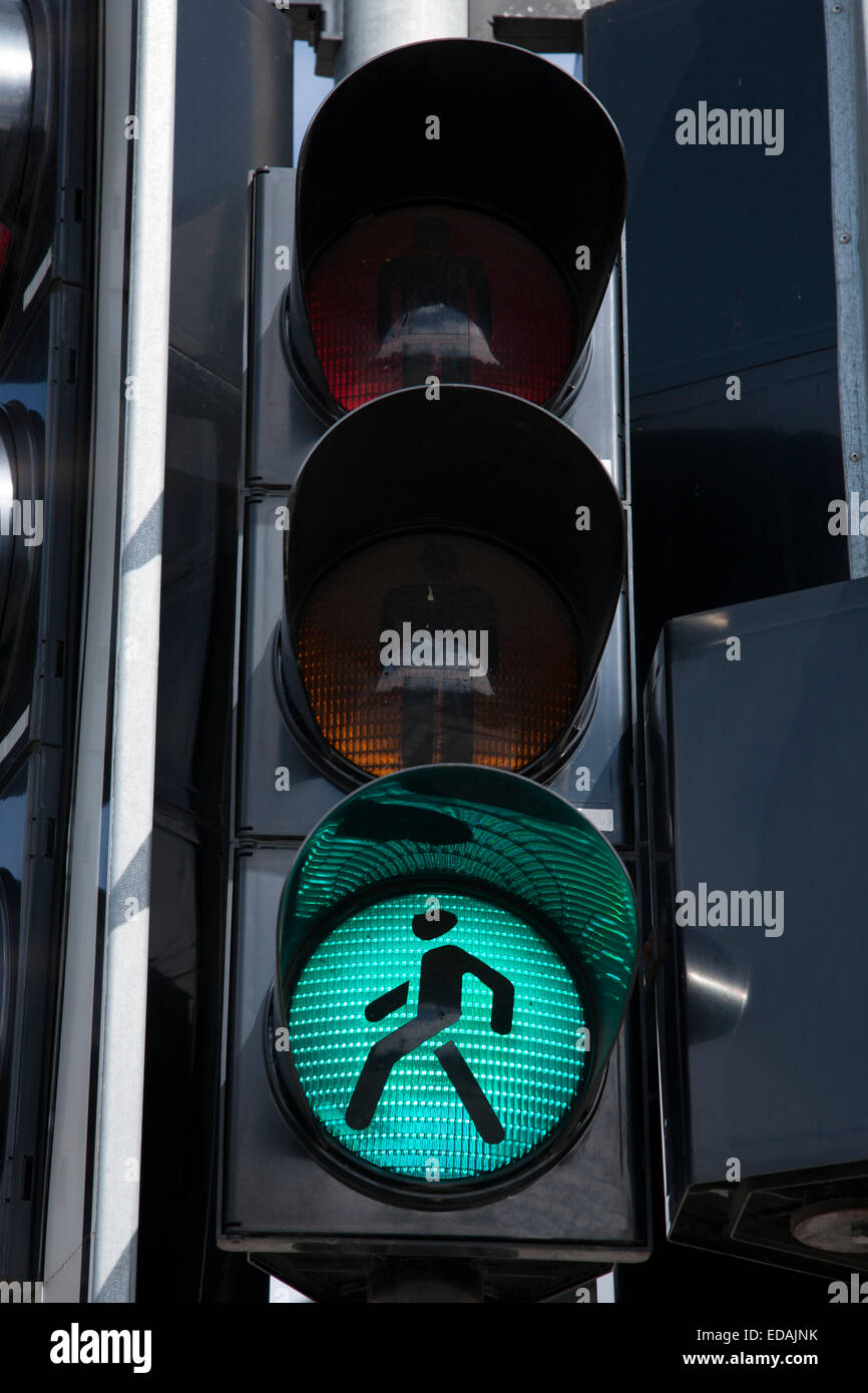 Green Pedestrian Traffic Light Sign against Blue Sky Stock Photo - Alamy