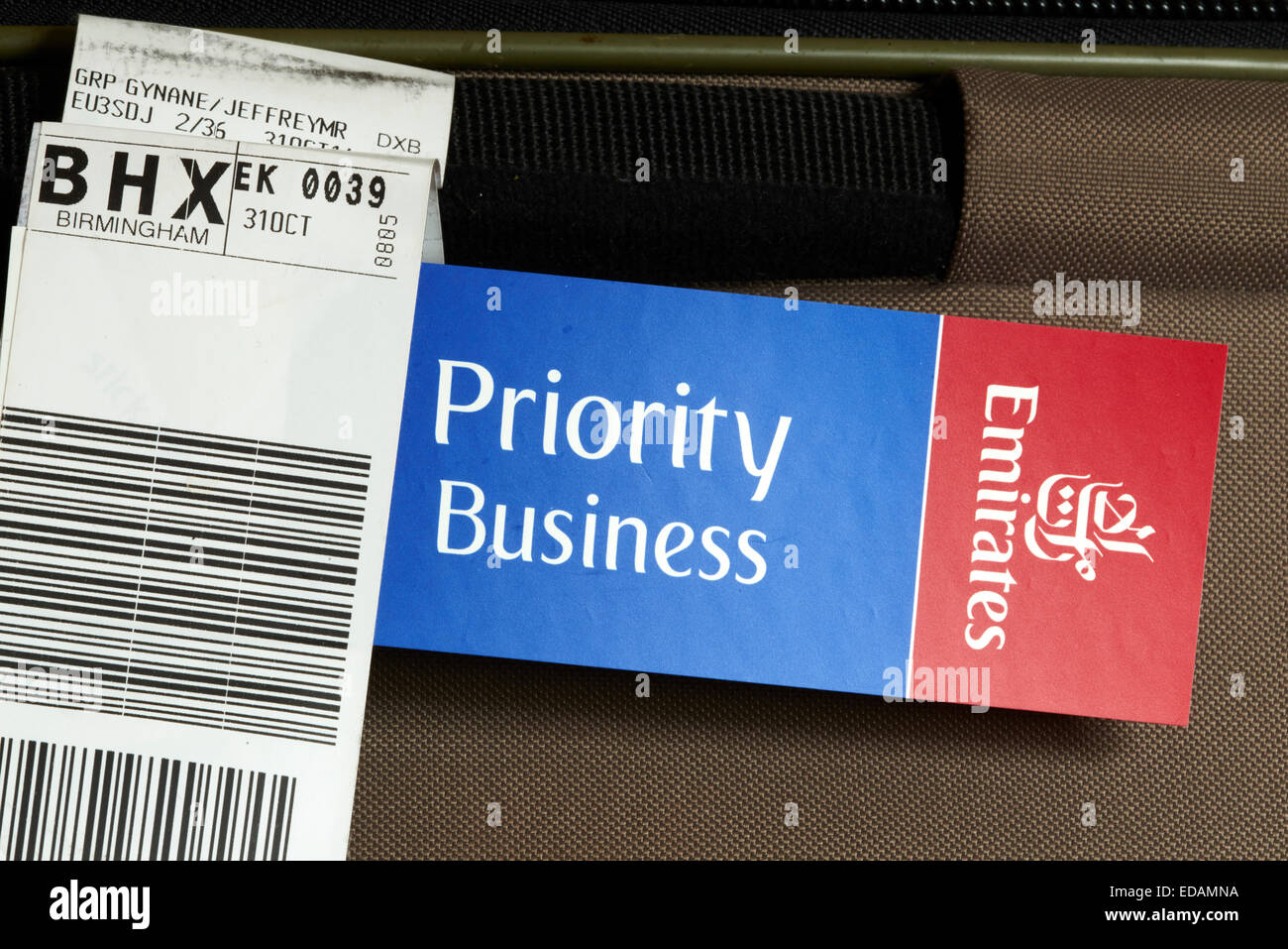 Emirates Priority Business Class Luggage Tag On A Suitcase Stock Photo -  Alamy