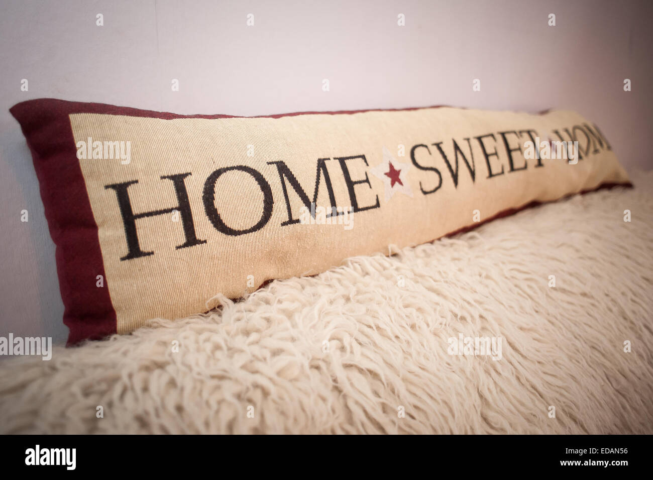 Home sweet home cushion Stock Photo
