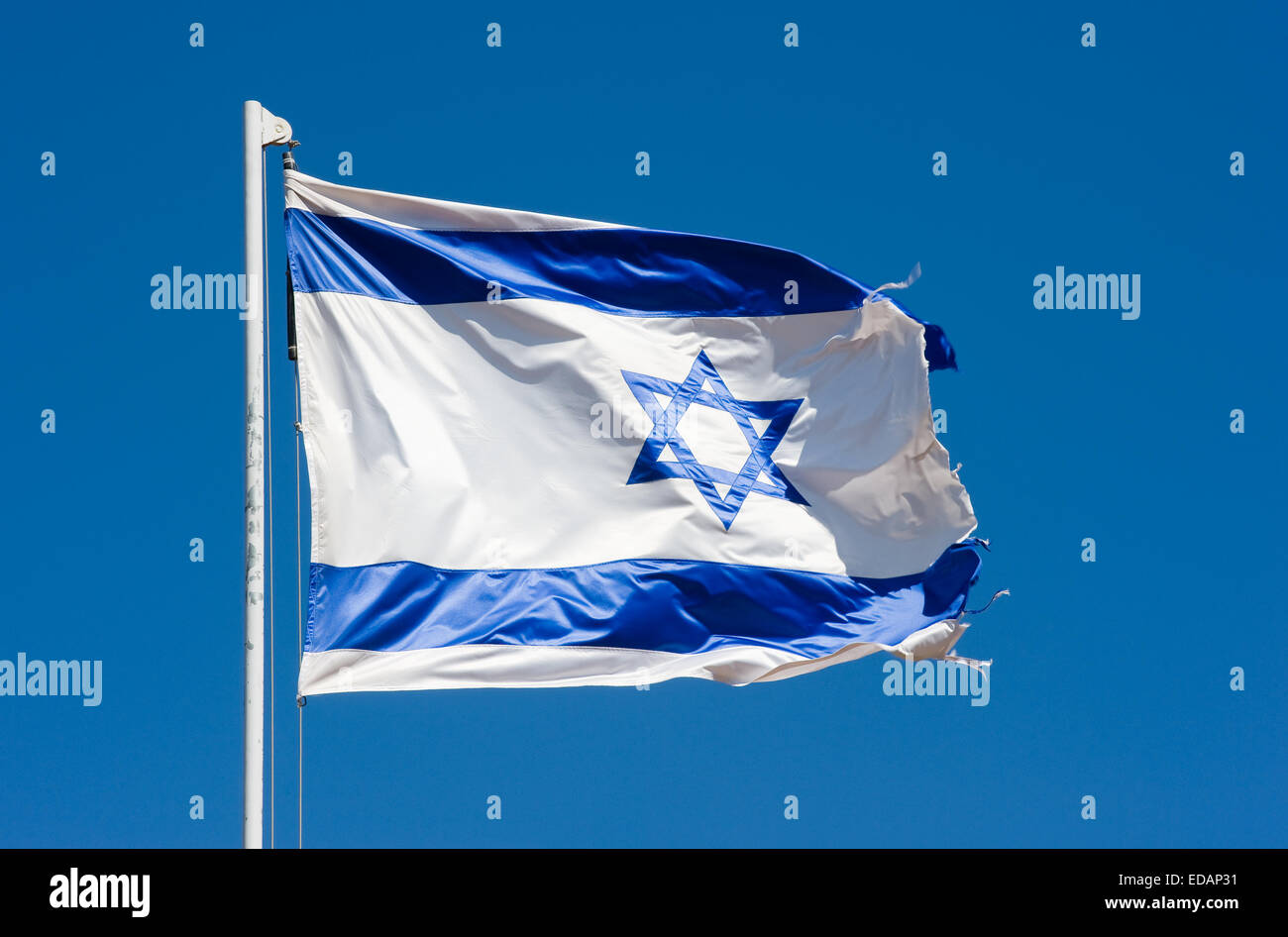 The Israelian flag waving in the wind Stock Photo